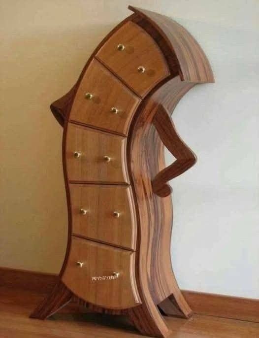 My husband and I got this dresser hutch recently and I want to paint it red. Hubby says no way…. lol we are under debate. He says leave it as original and I want to paint it. We are both waiting for others opinions.